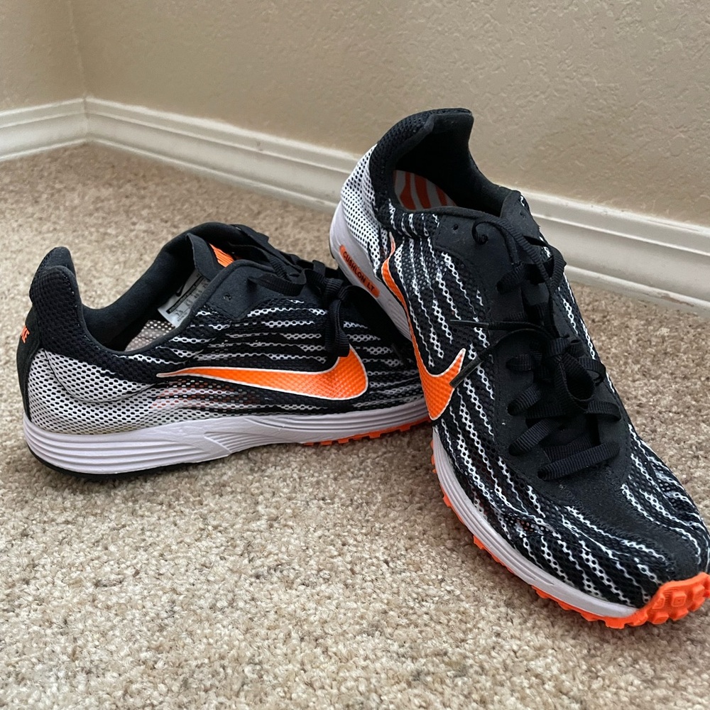Nike Streak LT Racing Flats. Never worn. Unisex. Men’s 7.5 - Women’s 9.